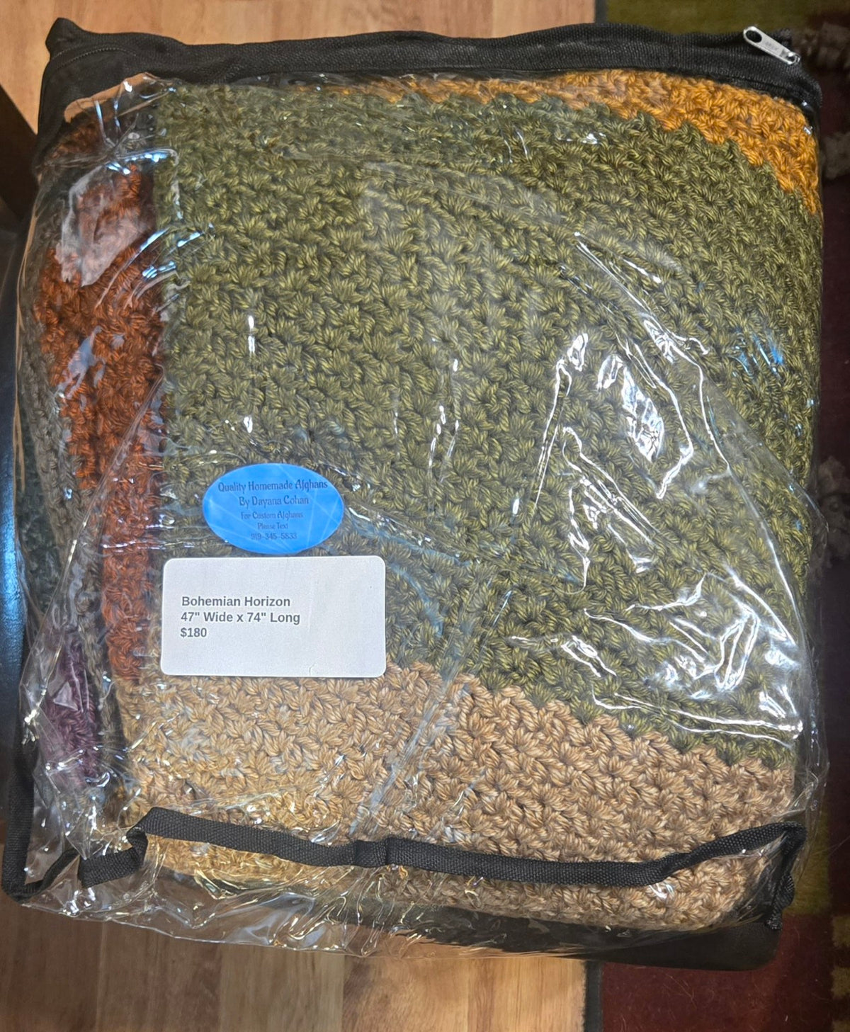 Bohemian Horizon handmade afghan in its protective storage case