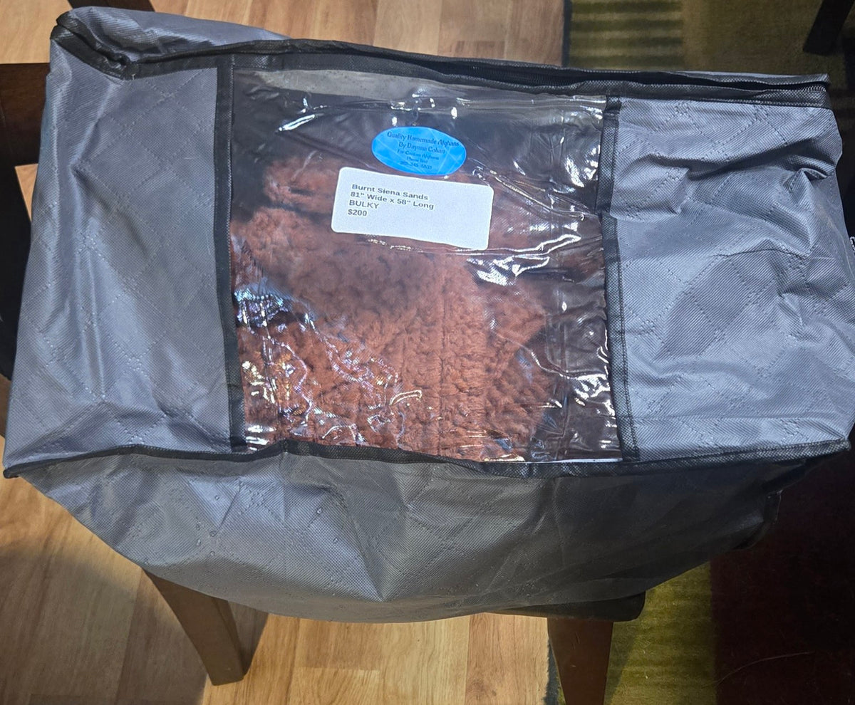Burnt Sienna Sands handmade afghan in its protective storage case
