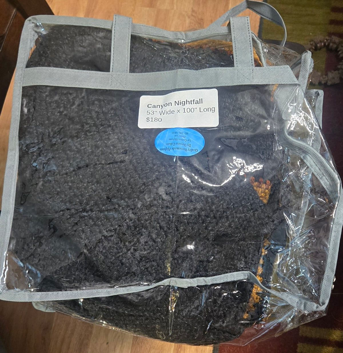Canyon Nightfall handmade afghan in its protective storage case