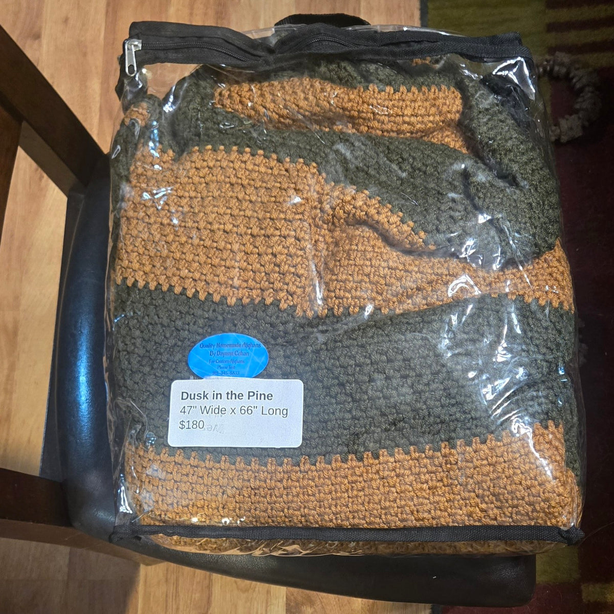 Dusk in the Pines handmade afghan in its protective storage case
