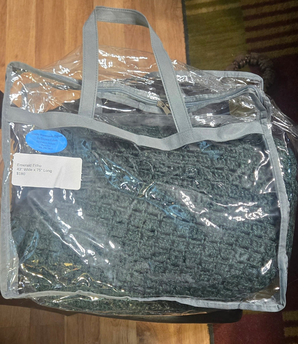 Emerald Echo handmade afghan in its protective storage case