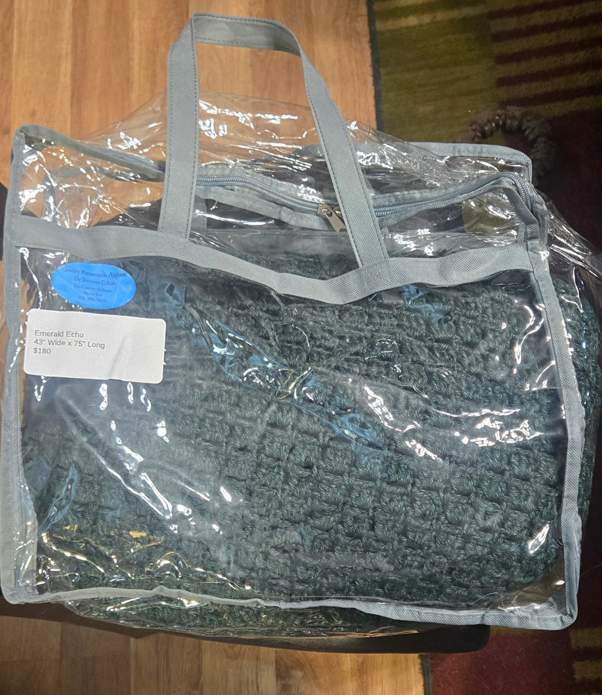 Emerald Echo handmade afghan in its protective storage case