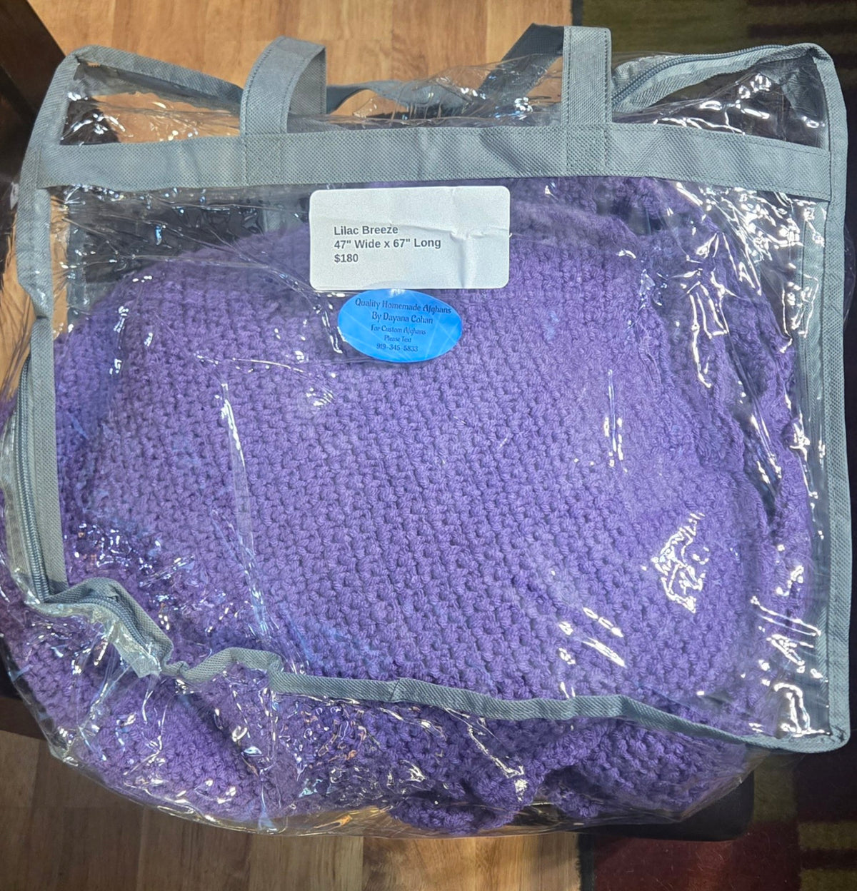 Lilac Breeze handmade afghan in its protective storage case