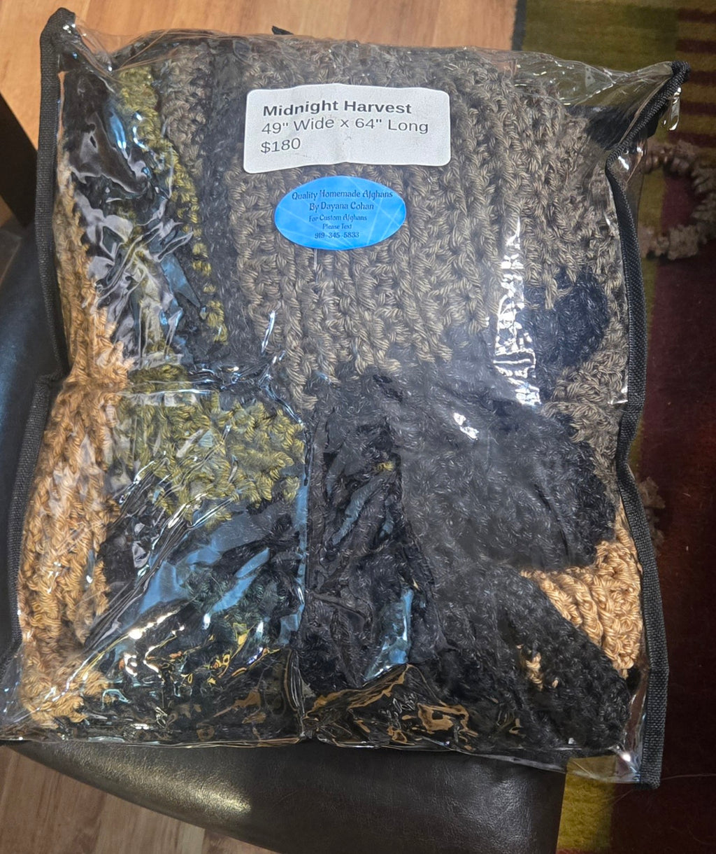 Midnight Harvest handmade afghan in its protective storage case