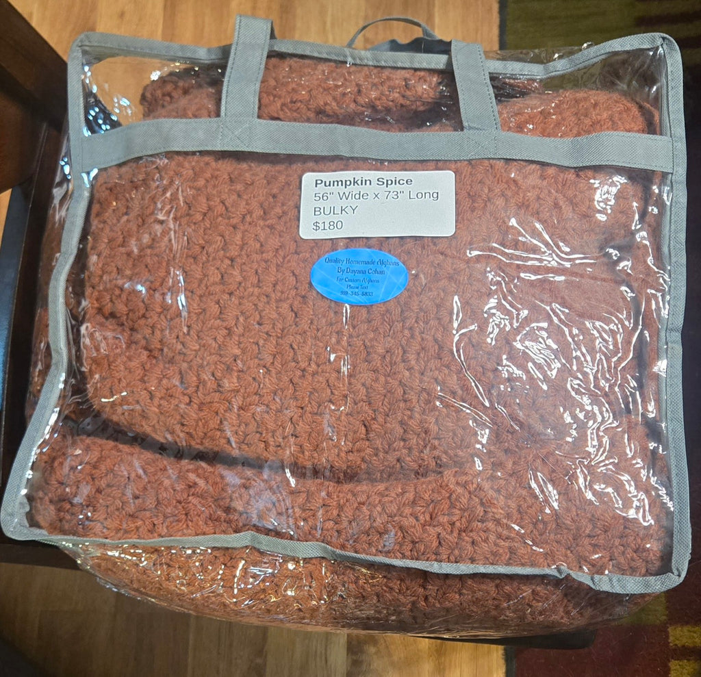 Pumpkin Spice handmade afghan in its protective storage case