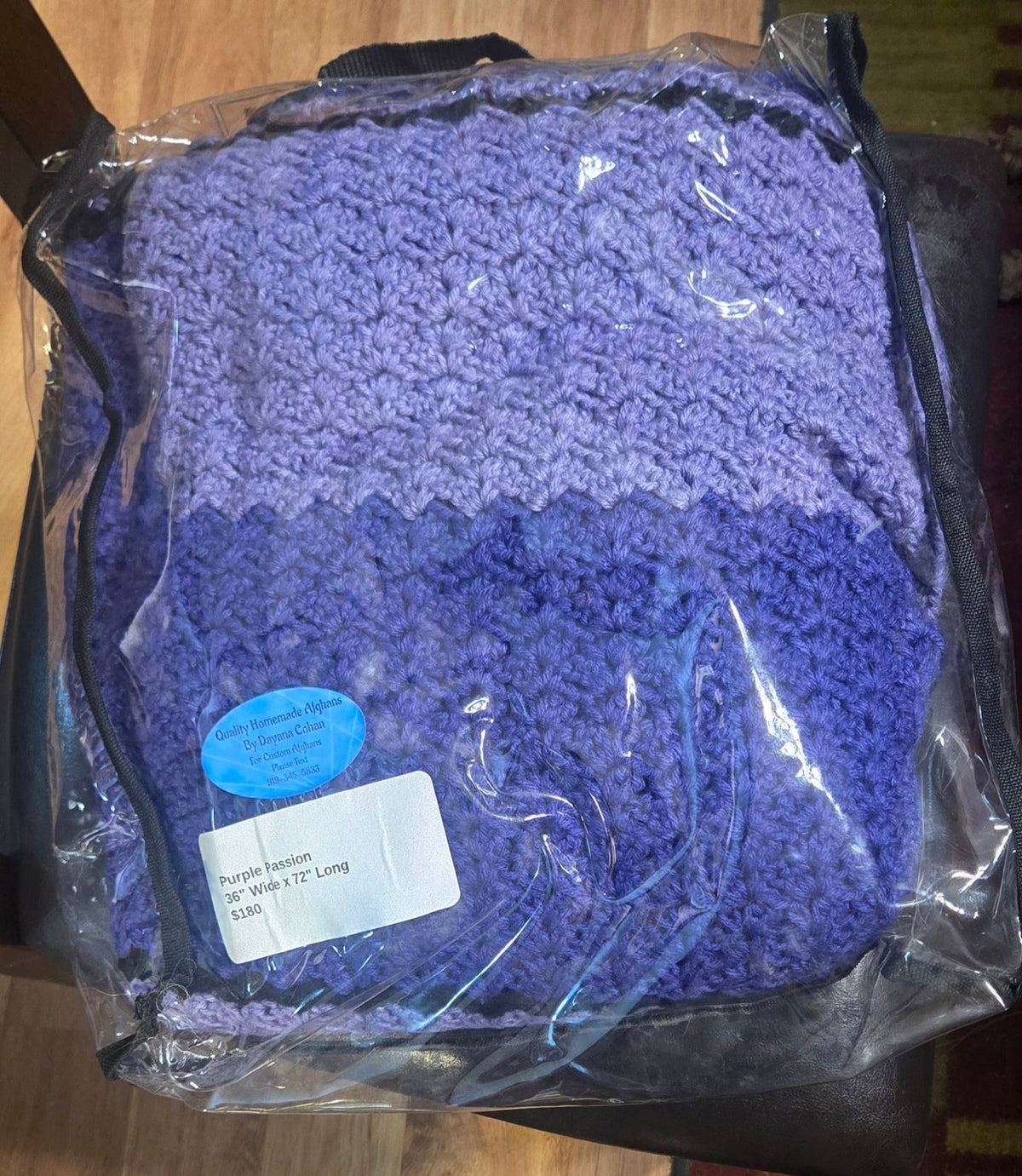 Purple Passion handmade afghan in its protective storage case