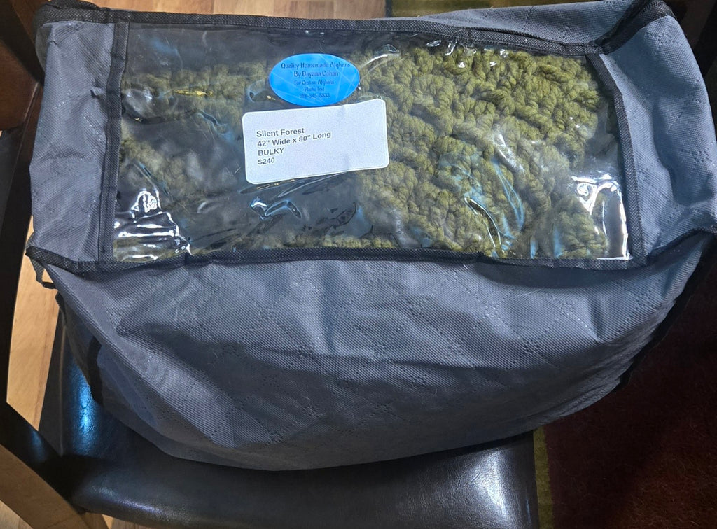Silent Forest handmade afghan in its protective storage case