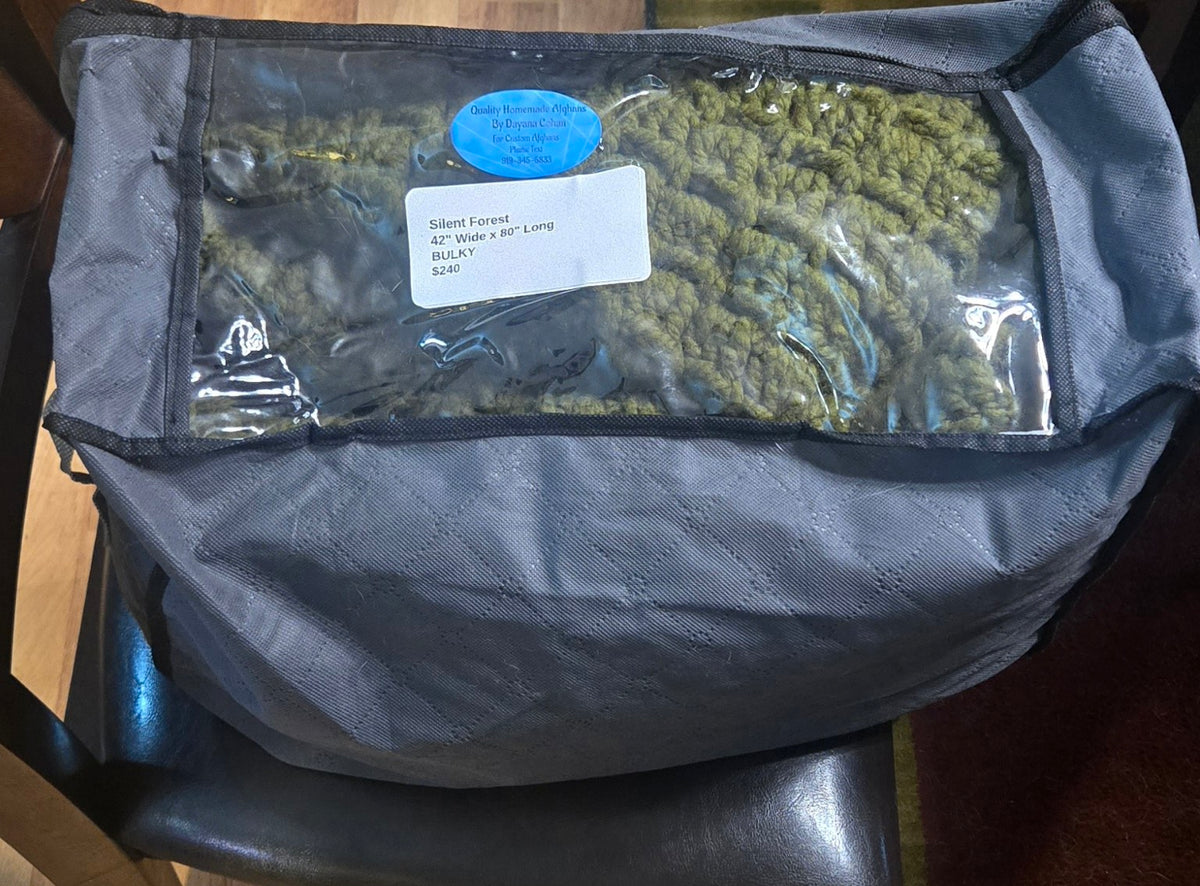 Silent Forest handmade afghan in its protective storage case